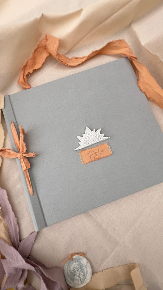 LIBRO COMUNIÓN EN TELA CON ADORNO ESTRELLA EN CERÁMICA